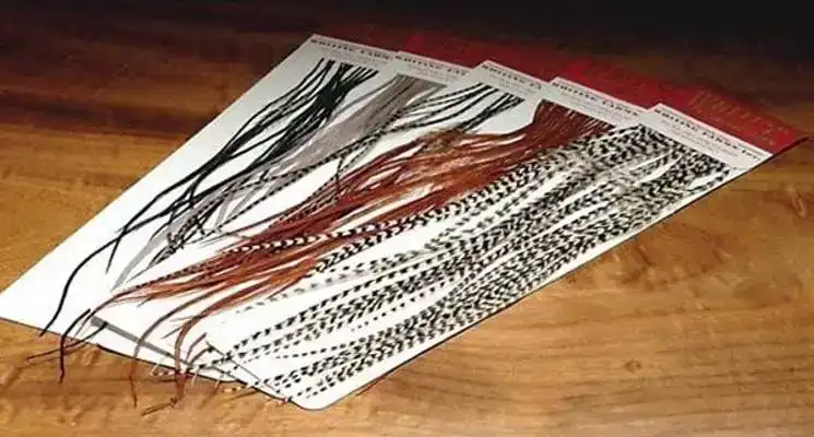 100 Saddle Hackle Packs - Silver Badger - Größe: 14